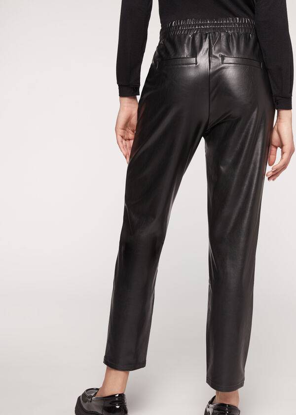 black womens calzedonia thermal coated effect with chain trim pants